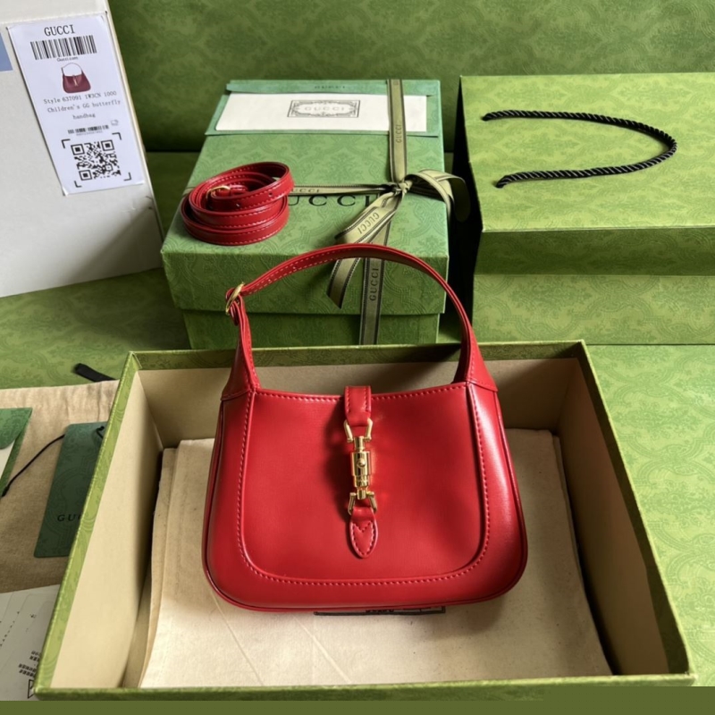 G*u*i top handle bags